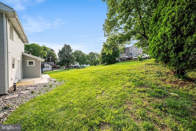 8255 Mertztown Rd, Alburtis, PA 18011 - view of grassy yard featuring a residential view and a patio