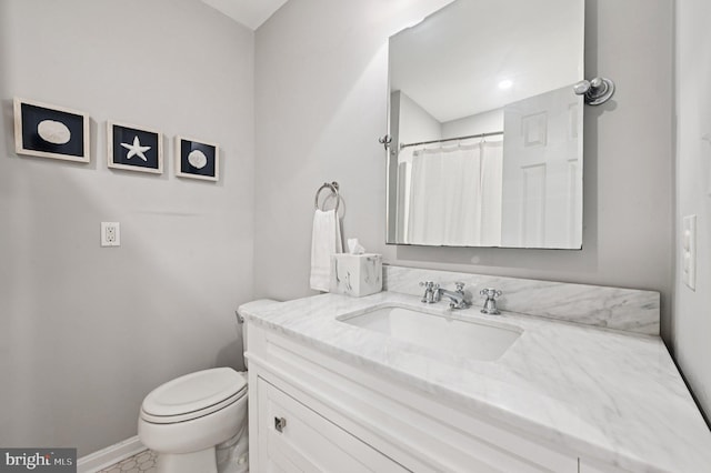 104 S St, Annapolis, MD 21401 - full bath with vanity, toilet, and baseboards
