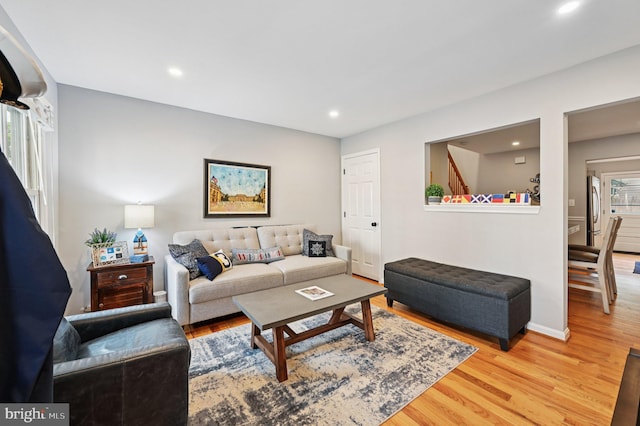104 S St, Annapolis, MD 21401 - living area with light wood finished floors, recessed lighting, and baseboards