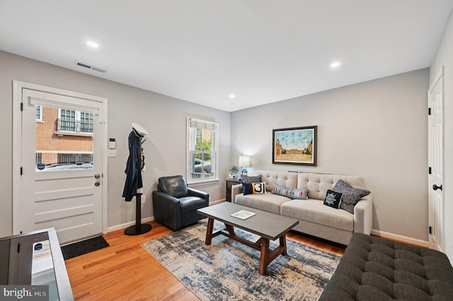 104 S St, Annapolis, MD 21401 - living room featuring light wood-type flooring, baseboards, and recessed lighting