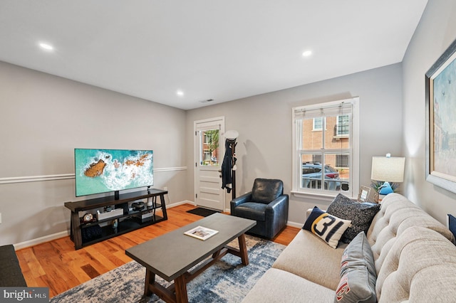 104 S St, Annapolis, MD 21401 - living room featuring light wood-style flooring, recessed lighting, and baseboards