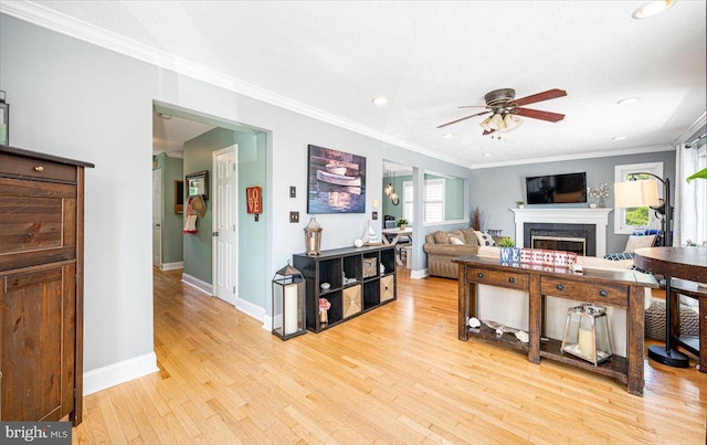 1323 Washington Dr, Annapolis, MD 21403 - living room with ceiling fan, light wood finished floors, a tile fireplace, baseboards, and recessed lighting