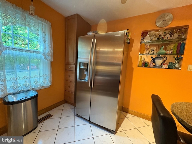 5930 Langton Dr, Franconia, VA 22310 - kitchen featuring stainless steel refrigerator with ice dispenser and light tile patterned flooring