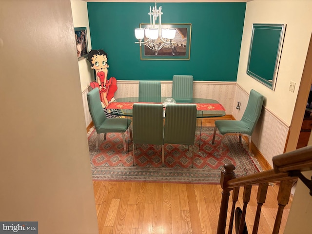 5930 Langton Dr, Franconia, VA 22310 - dining area with wainscoting, wood finished floors, a chandelier, and breakfast area
