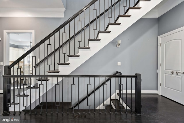 1200 Prince Edward St, Fredericksburg, VA 22401 - stairs featuring ornamental molding, baseboards, and a chandelier