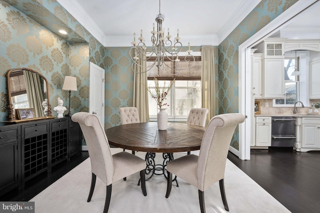 1200 Prince Edward St, Fredericksburg, VA 22401 - dining area with dark wood-style floors, a chandelier, wallpapered walls, and ornamental molding