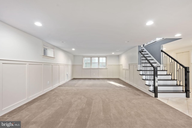 1200 Prince Edward St, Fredericksburg, VA 22401 - below grade area with a decorative wall, stairway, recessed lighting, carpet flooring, and a wainscoted wall