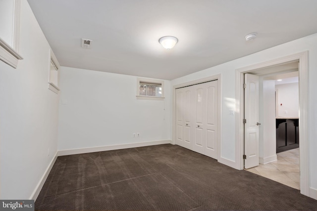 1200 Prince Edward St, Fredericksburg, VA 22401 - unfurnished bedroom with carpet flooring, a closet, and baseboards