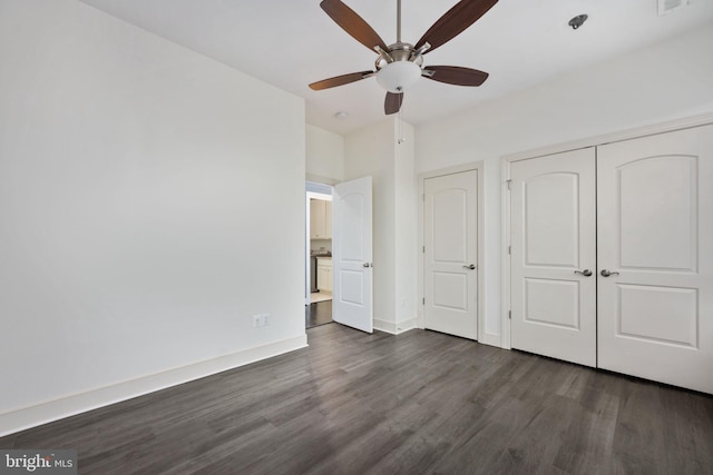1200 Prince Edward St, Fredericksburg, VA 22401 - unfurnished bedroom featuring dark wood-style flooring, baseboards, a closet, and a ceiling fan