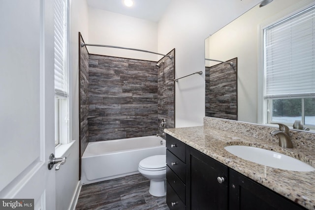 1200 Prince Edward St, Fredericksburg, VA 22401 - full bath with vanity, toilet, shower / tub combination, and wood finished floors