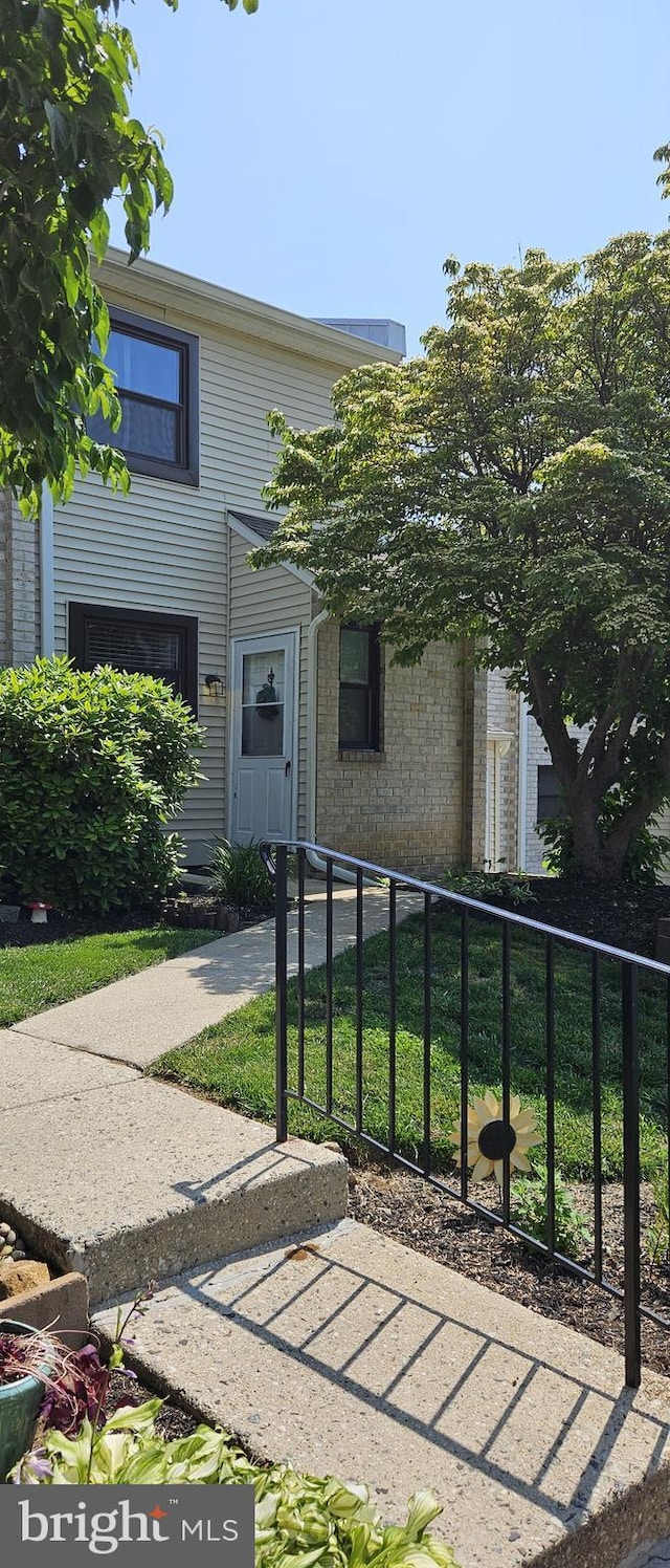 1605 Valley Dr Unit 1605, West Chester, PA 19382 - view of front of house featuring brick siding