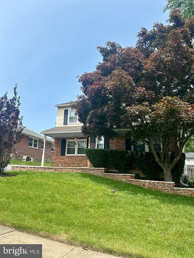 2317 Poplar Rd Unit 24, Havertown, PA 19083 - view of front of house with a front yard and brick siding