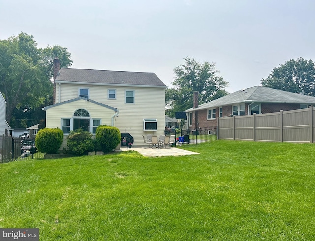2317 Poplar Rd Unit 24, Havertown, PA 19083 - rear view of property featuring a patio and a chimney