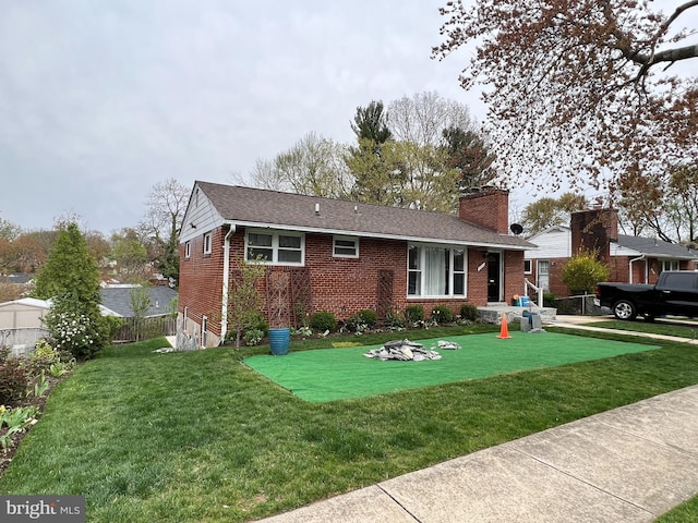 10213 Duvawn Pl, Silver Spring, MD 20902 - view of front of house featuring brick siding, a chimney, and a shingled roof