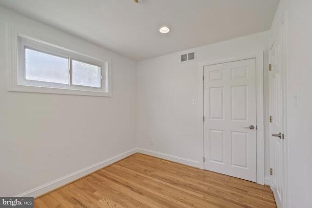 10213 Duvawn Pl, Silver Spring, MD 20902 - empty room with light wood finished floors and recessed lighting