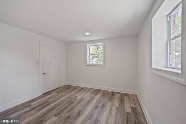 10213 Duvawn Pl, Silver Spring, MD 20902 - empty room with wood finished floors and recessed lighting