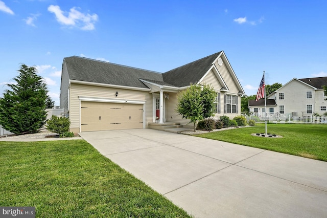 44 Homberg Cir, Dover, DE 19904 - view of front of home with an attached garage and driveway