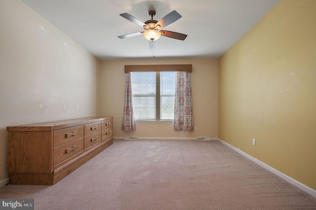 44 Homberg Cir, Dover, DE 19904 - spare room featuring a ceiling fan, light carpet, and baseboards