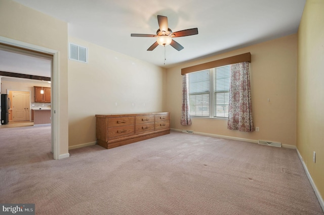 44 Homberg Cir, Dover, DE 19904 - empty room with a ceiling fan, light carpet, and baseboards