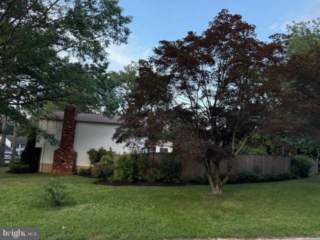 1247 Silver Run Dr, Pasadena, MD 21122 - view of property exterior with a chimney