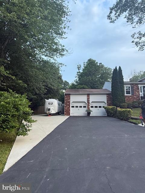 1247 Silver Run Dr, Pasadena, MD 21122 - garage with asphalt driveway