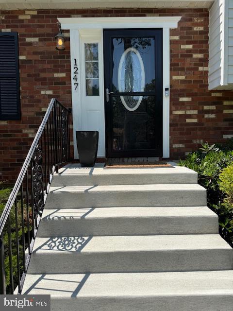 1247 Silver Run Dr, Pasadena, MD 21122 - doorway to property featuring brick siding