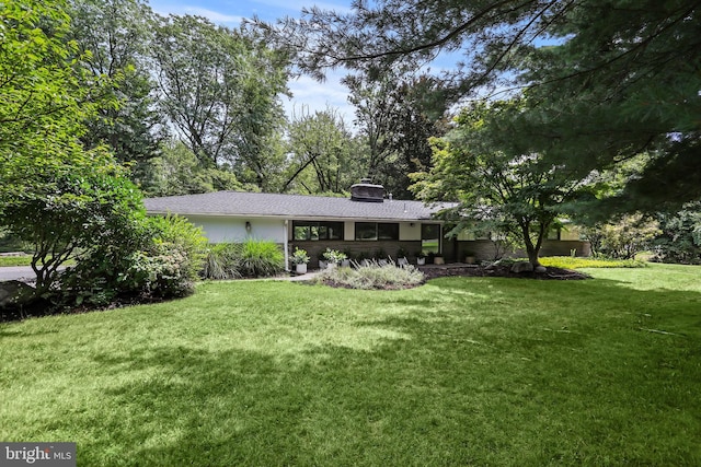 1004 Mercer Rd, Princeton, NJ 08540 - view of front of home with a front lawn and a chimney