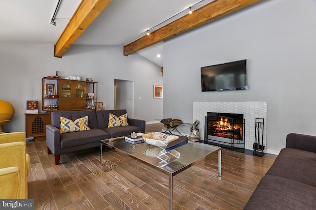 1004 Mercer Rd, Princeton, NJ 08540 - living room with wood finished floors, a fireplace with flush hearth, track lighting, and baseboards