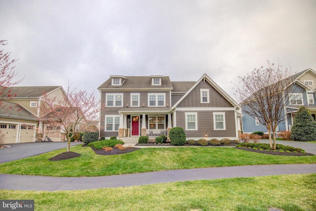 41031 Brook Grove Dr, Aldie, VA 20105 - view of front of property featuring a porch, board and batten siding, and a front yard