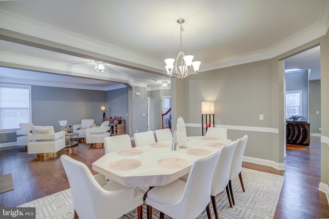 41031 Brook Grove Dr, Aldie, VA 20105 - dining space with a chandelier, wood finished floors, ornamental molding, and baseboards