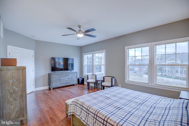 41031 Brook Grove Dr, Aldie, VA 20105 - bedroom with wood finished floors, baseboards, and a ceiling fan
