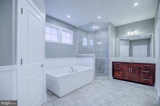41031 Brook Grove Dr, Aldie, VA 20105 - bathroom with a stall shower, vanity, a garden tub, and recessed lighting