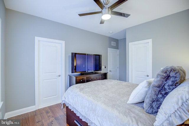 41031 Brook Grove Dr, Aldie, VA 20105 - bedroom with dark wood-type flooring, baseboards, and a ceiling fan