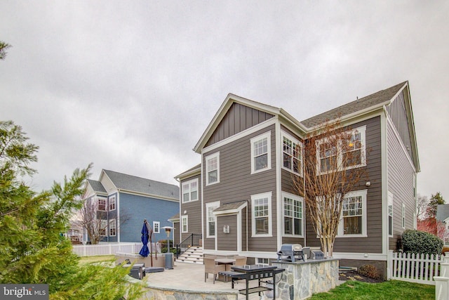 41031 Brook Grove Dr, Aldie, VA 20105 - back of property featuring a patio and board and batten siding