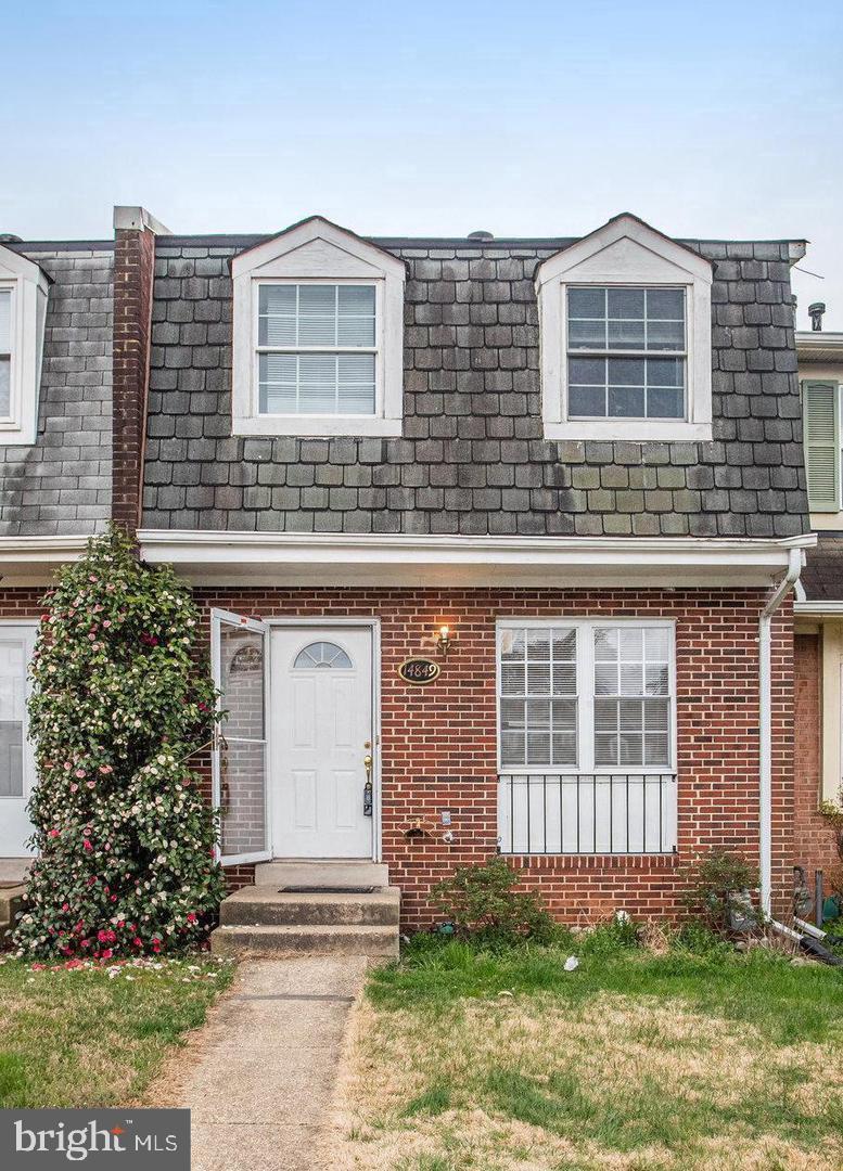 14849 Ensor Ct, Woodbridge, VA 22193 - multi unit property with mansard roof, a shingled roof, brick siding, and a front lawn