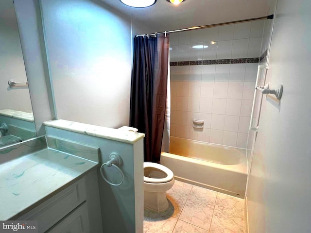 8350 Greensboro Dr Unit 218, Mclean, VA 22102 - bathroom featuring shower / bath combo with shower curtain, vanity, and marble look tile flooring