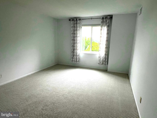 8350 Greensboro Dr Unit 218, Mclean, VA 22102 - carpeted empty room with baseboards