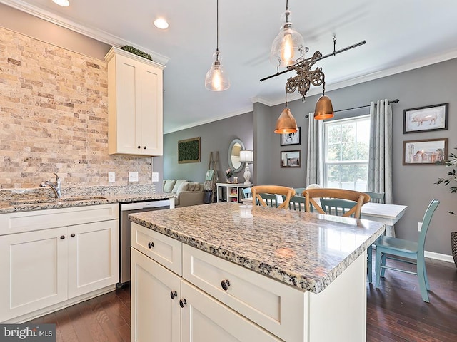 3611 Jacob Stout Rd Unit 5, Doylestown, PA 18902 - kitchen featuring a sink, ornamental molding, dark wood-style floors, light stone counters, and dishwasher