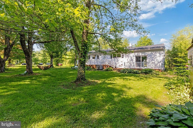 297 Killian Rd, Honey Brook, PA 19344 - view of grassy yard with a wooden deck