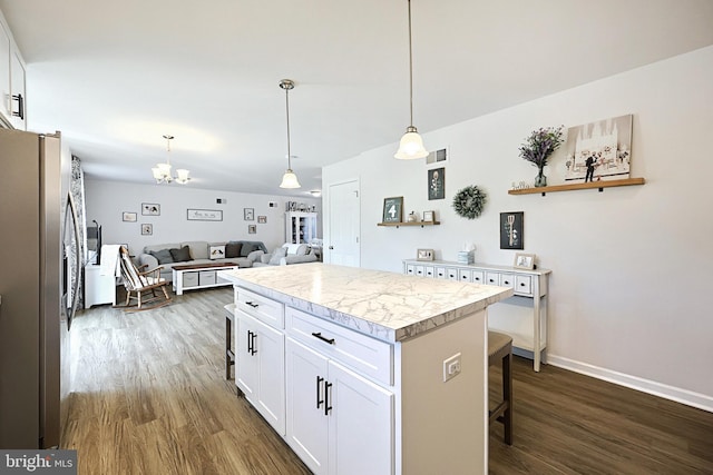 252 Valley View Cir, York, PA 17408 - kitchen featuring stainless steel fridge with ice dispenser, dark wood finished floors, light countertops, white cabinets, and a chandelier