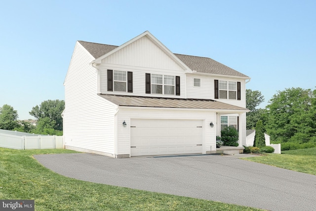 252 Valley View Cir, York, PA 17408 - traditional-style house featuring driveway, an attached garage, a standing seam roof, and metal roof