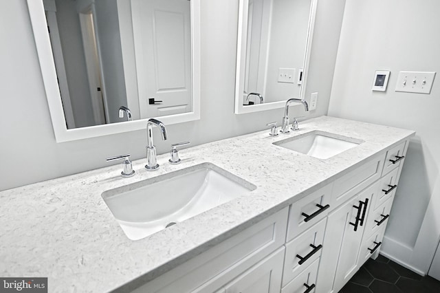 2741 Primrose Ln N, York, PA 17404 - bathroom with double vanity and tile patterned floors