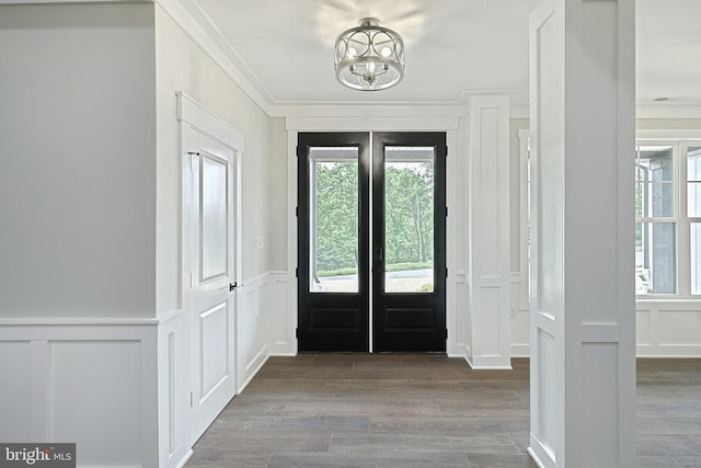 2741 Primrose Ln N, York, PA 17404 - entrance foyer featuring a decorative wall, french doors, a chandelier, plenty of natural light, and ornamental molding