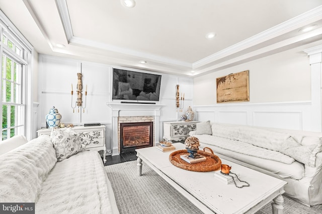 3209 Henson Ave, Annapolis, MD 21403 - living room featuring a decorative wall, ornamental molding, a raised ceiling, a fireplace, and recessed lighting