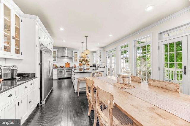 3209 Henson Ave, Annapolis, MD 21403 - dining area featuring crown molding, recessed lighting, french doors, and dark wood finished floors