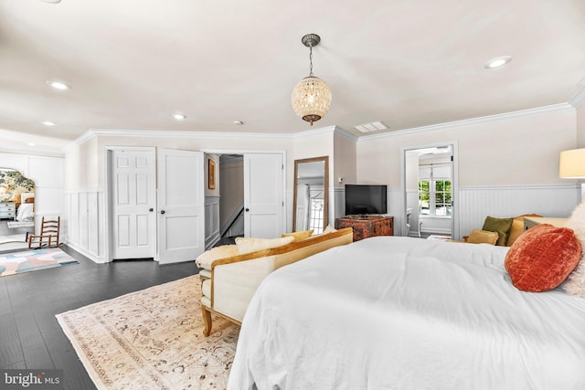 3209 Henson Ave, Annapolis, MD 21403 - bedroom with a wainscoted wall, crown molding, dark wood finished floors, and recessed lighting