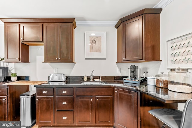 3209 Henson Ave, Annapolis, MD 21403 - kitchen with crown molding and dark stone countertops