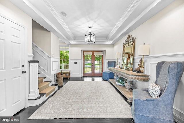 3209 Henson Ave, Annapolis, MD 21403 - foyer entrance with a decorative wall, stairs, french doors, wainscoting, and a tray ceiling