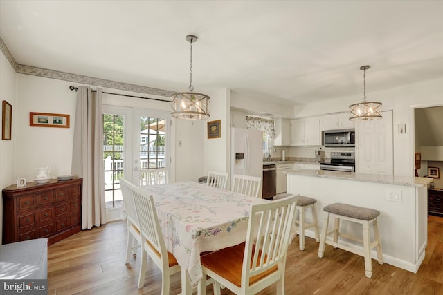 143 Brittany Dr, Chalfont, PA 18914 - dining area featuring a chandelier and light wood finished floors