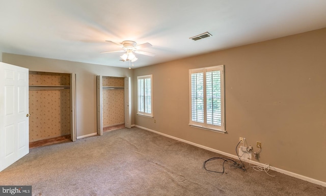722 Scotch Way Unit C-26, West Chester, PA 19382 - unfurnished bedroom with multiple closets, carpet, baseboards, and ceiling fan